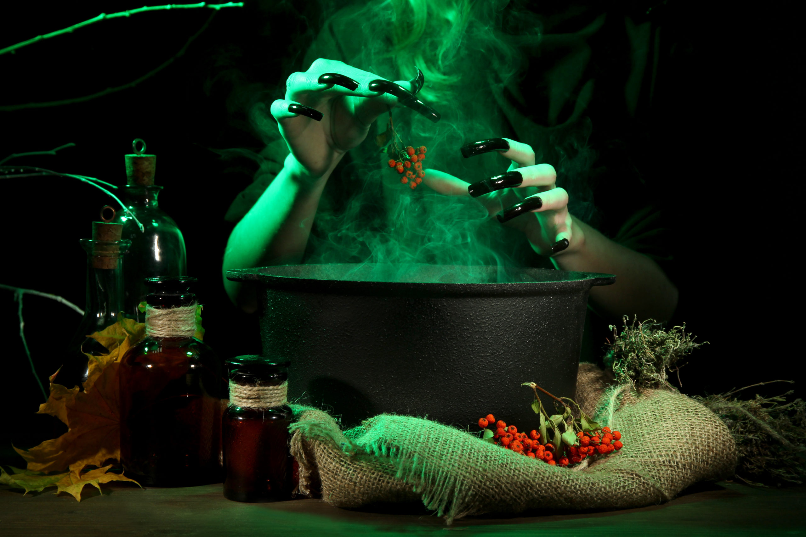 The Witch's Cauldron Escape Room - brewing a potion in a cauldron